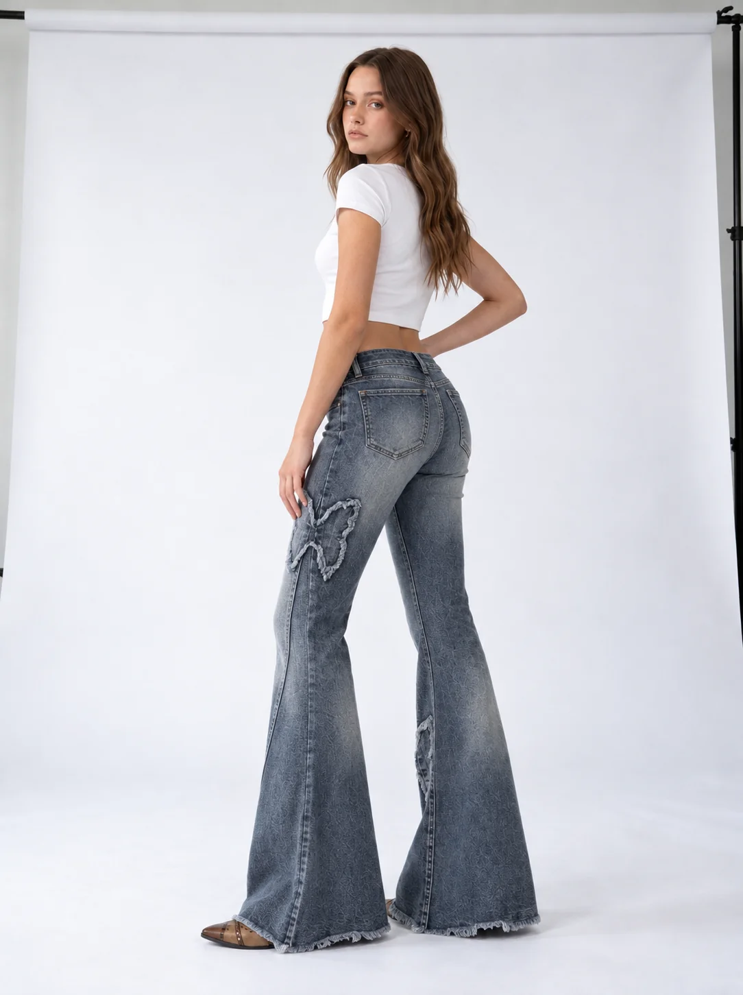 Butterfly Patch Flare Jeans on model 8